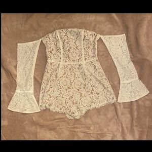 Tobi, S/P, romper with white with tan lining.